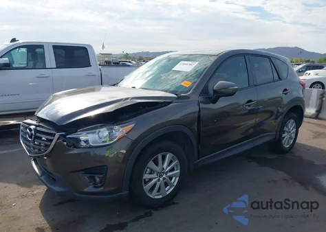 2016 Mazda Cx-5 Touring z USA, uszkodzony, nr VIN JM3KE2CY6G0900829
